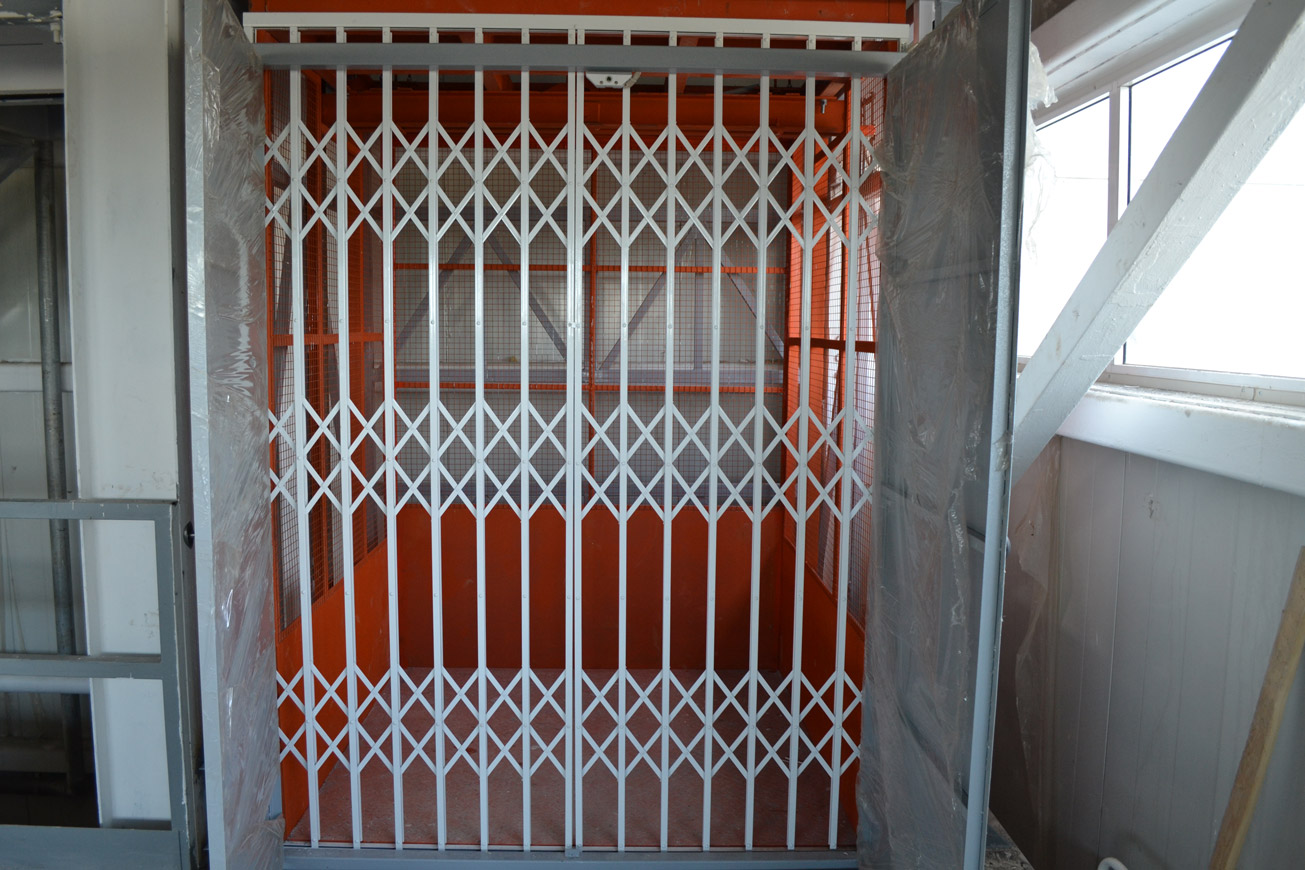 Подъемник грузовой в металлокаркасной шахте, 1000 кг, Иваново